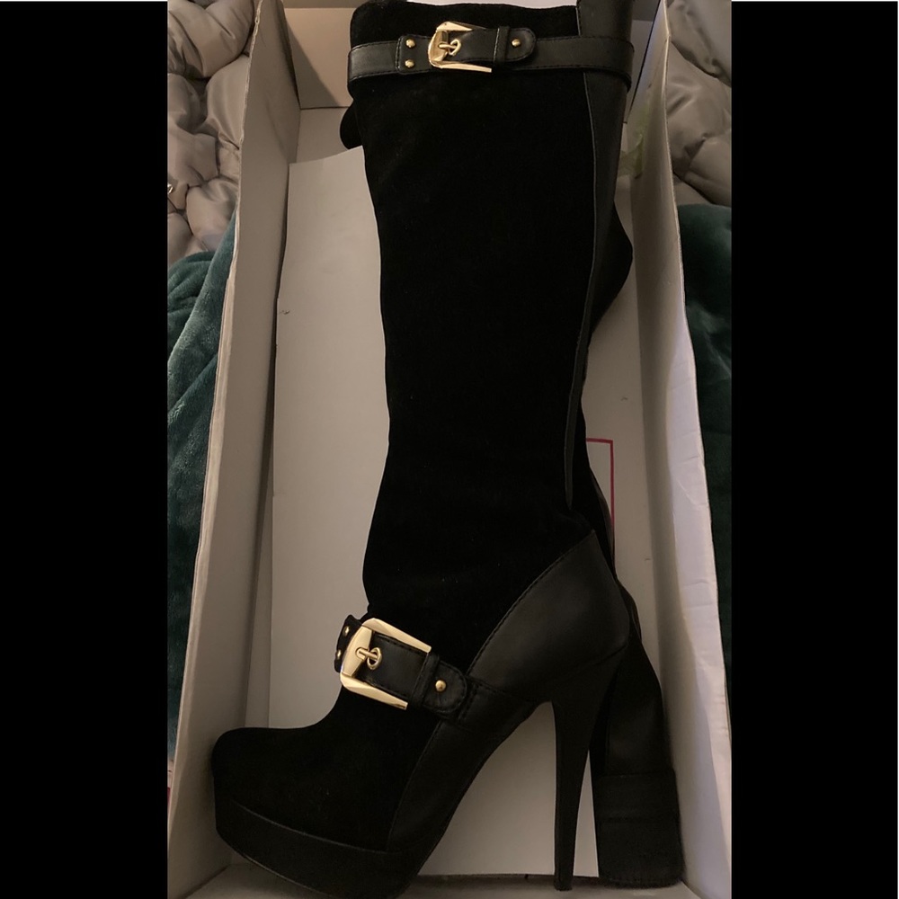 NWT Black knee high stiletto boots.  Size 9
